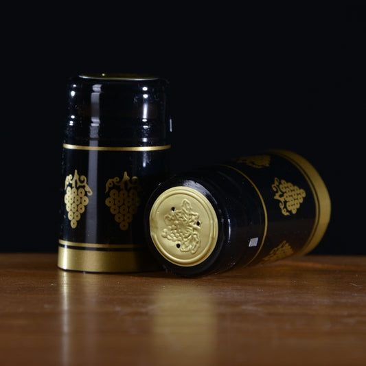 Black with gold grapes wine capsule