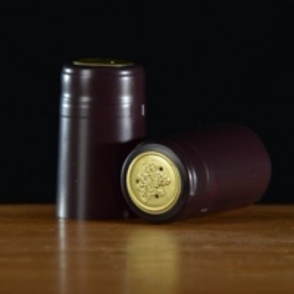 Burgundy and gold wine capsule